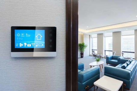 Smart thermostat in hallway
